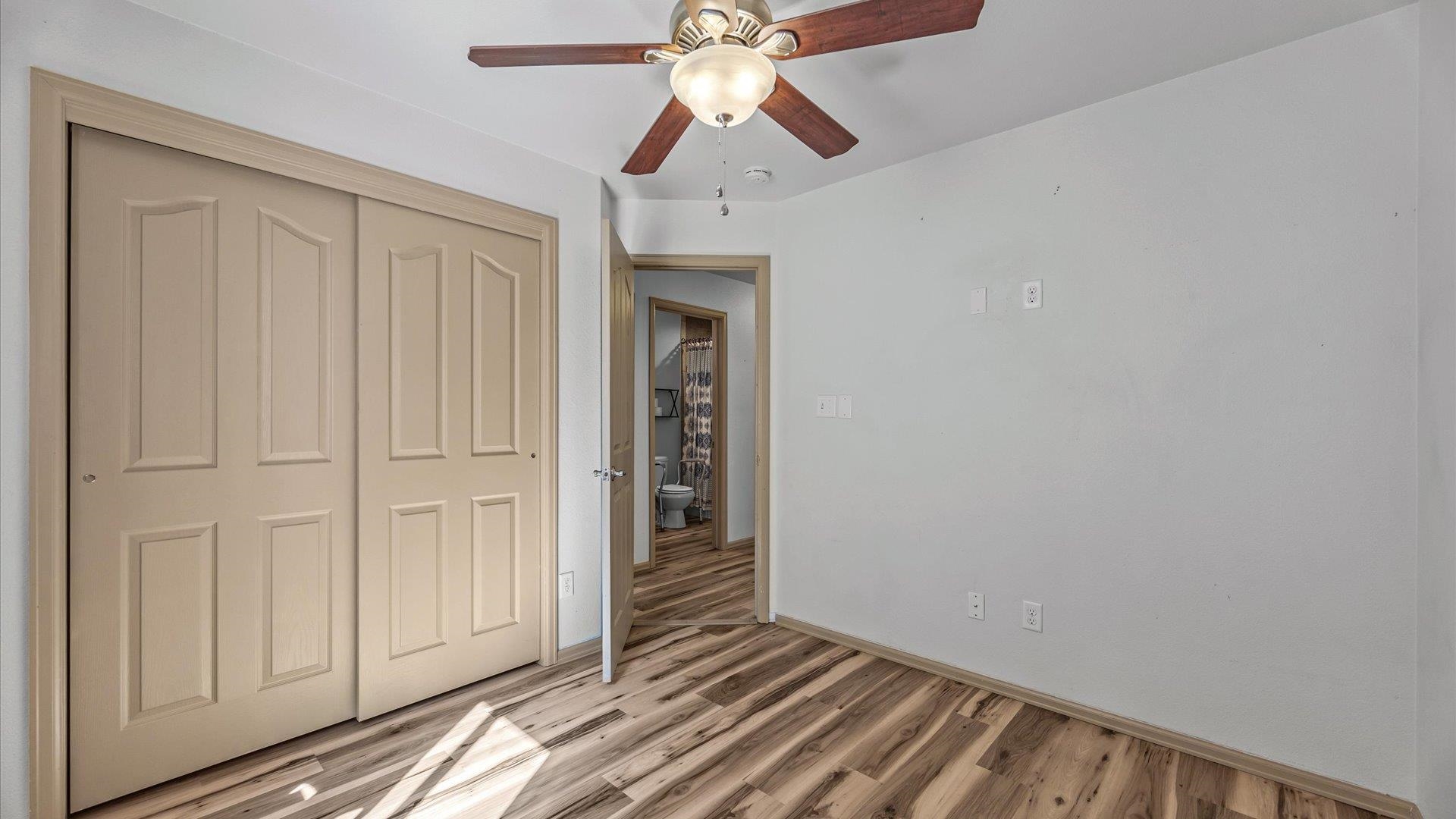 596 Sinatra Way Grand Junction, CO 81501 - Photo 7 of 20 a view of room with chandelier fan