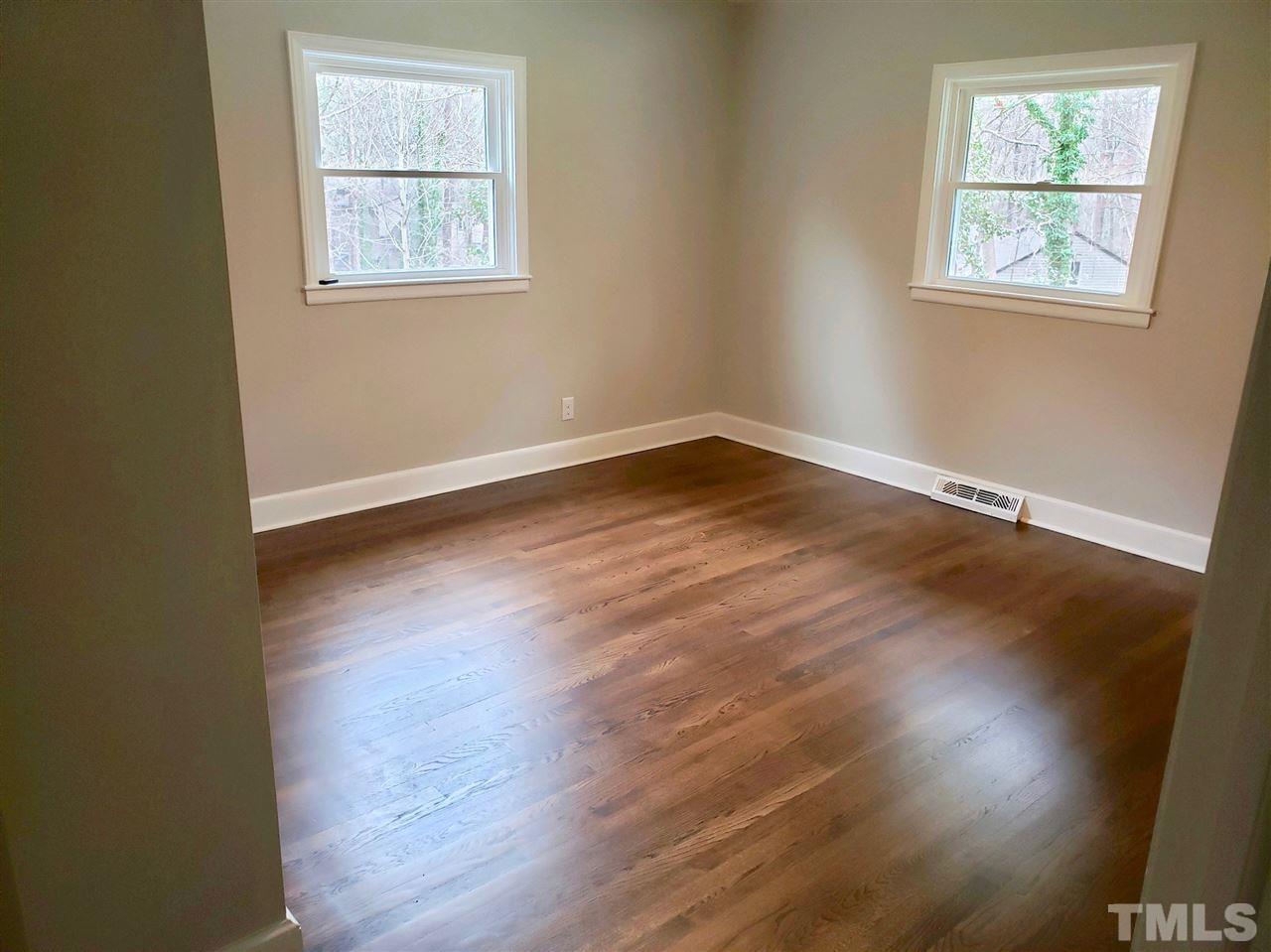 611 Wofford Road Durham, NC 27707 - Photo 22 of 30 Original Hardwood Floors refinished! New Windows through out the house.