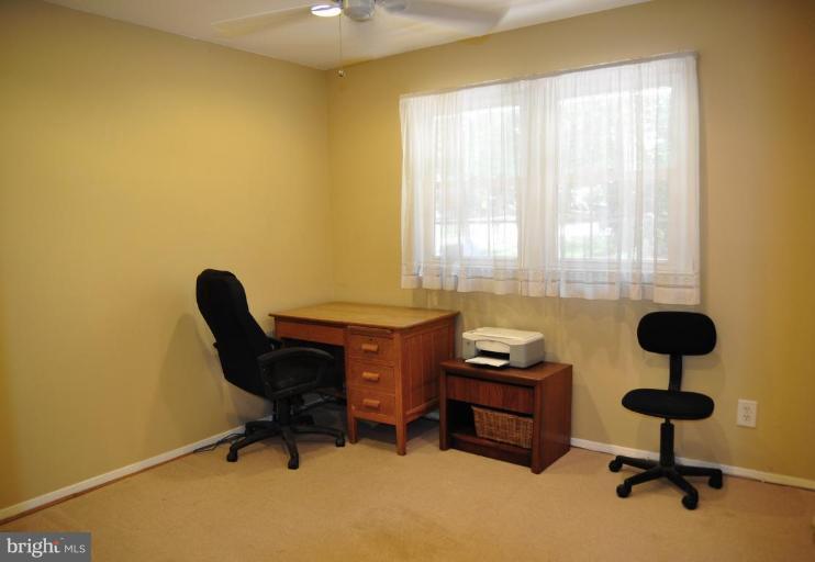 5229 Inverchapel Road Springfield, VA 22151 - Photo 20 of 27 a living room with furniture and a window