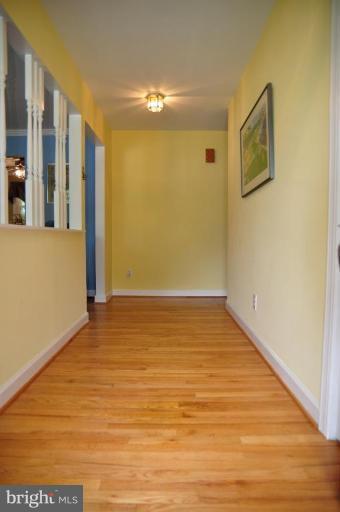5229 Inverchapel Road Springfield, VA 22151 - Photo 3 of 27 a view of an empty room with wooden floor