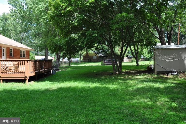 5229 Inverchapel Road Springfield, VA 22151 - Photo 27 of 27 a view of backyard with deck and garden