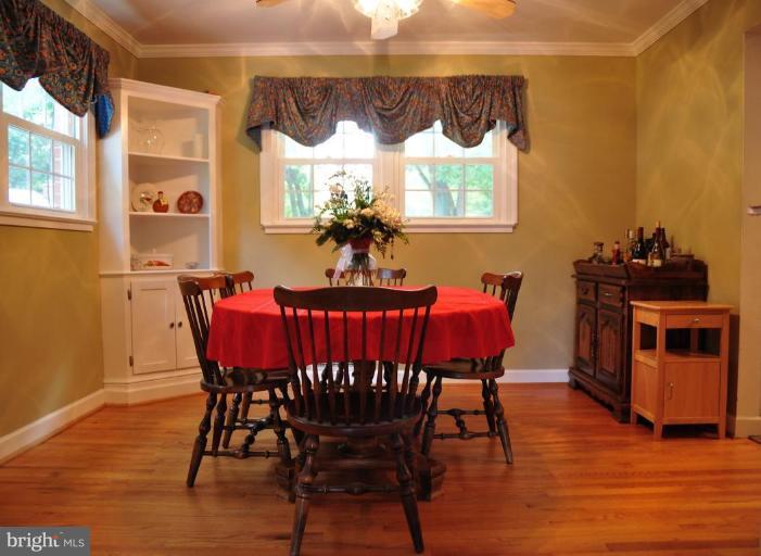 5229 Inverchapel Road Springfield, VA 22151 - Photo 5 of 27 a view of a dining room with furniture window and wooden floor