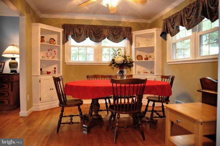 5229 Inverchapel Road Springfield, VA 22151 - Photo 6 of 27 a view of a dining room with furniture window and wooden floor