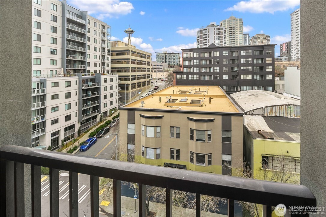 2607 Western Avenue, Unit 612 Seattle, WA 98121 - Photo 15 of 29 a view of a building from a balcony