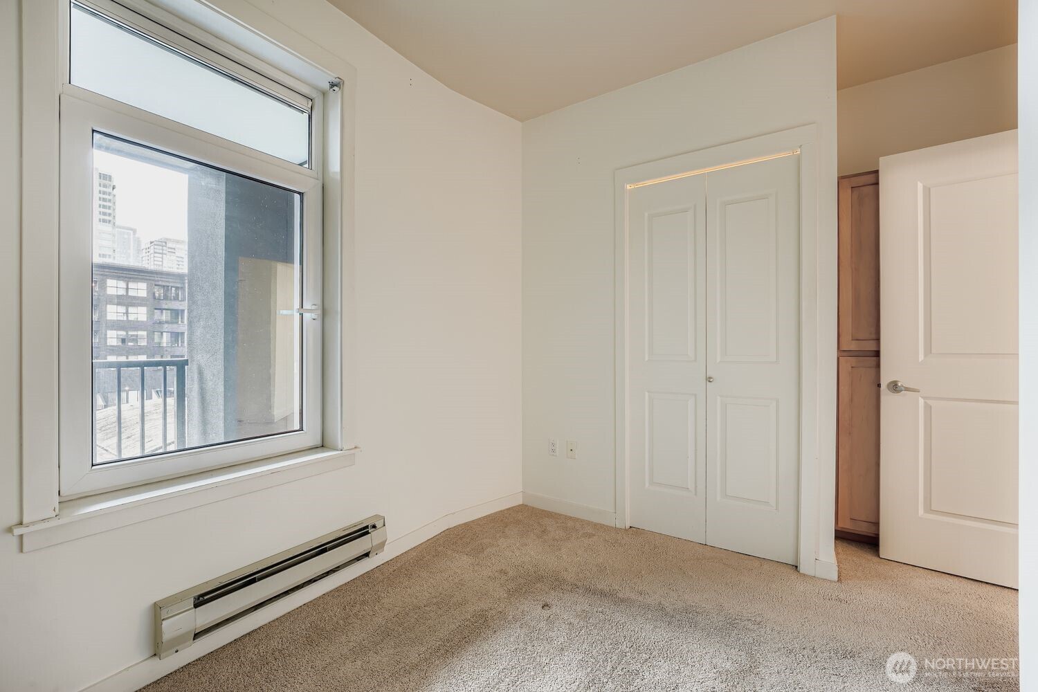 2607 Western Avenue, Unit 612 Seattle, WA 98121 - Photo 17 of 29 a view of a room with rack on the wall