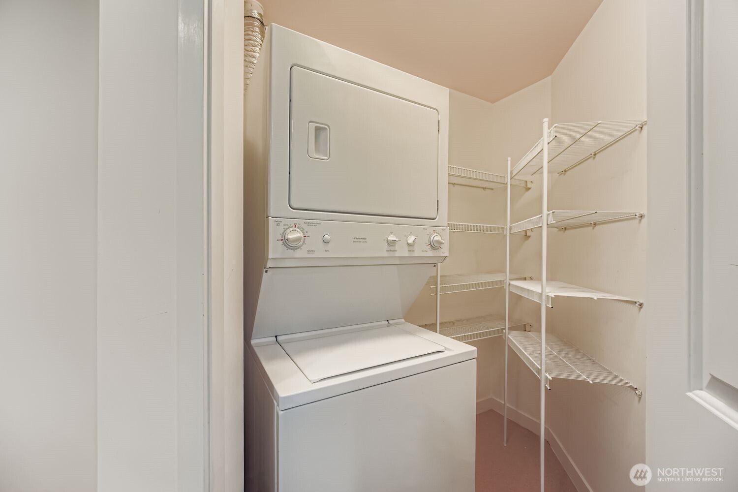 2607 Western Avenue, Unit 612 Seattle, WA 98121 - Photo 20 of 29 a utility room with dryer and washer