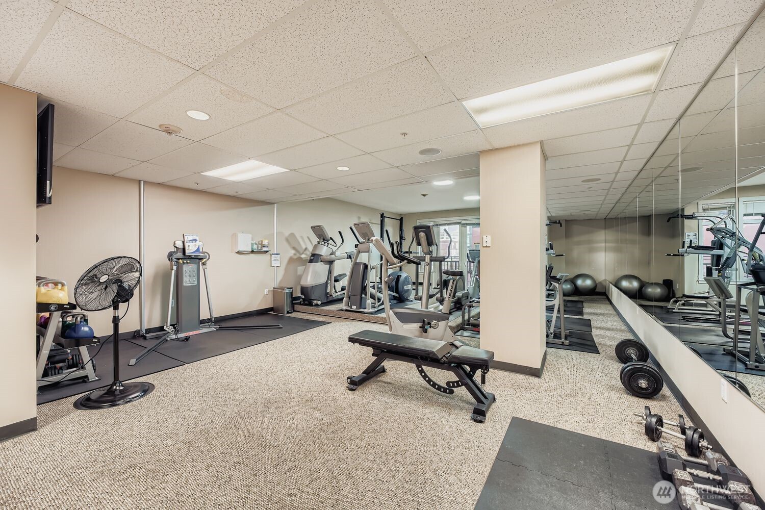 2607 Western Avenue, Unit 612 Seattle, WA 98121 - Photo 21 of 29 a view of a room with gym equipment