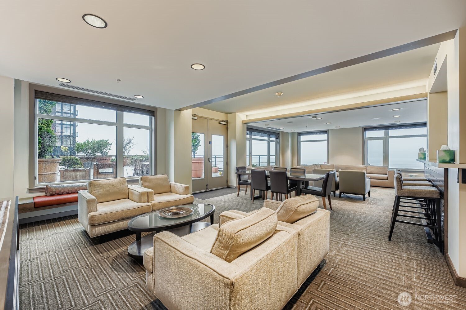 2607 Western Avenue, Unit 612 Seattle, WA 98121 - Photo 22 of 29 a living room with furniture and a large window