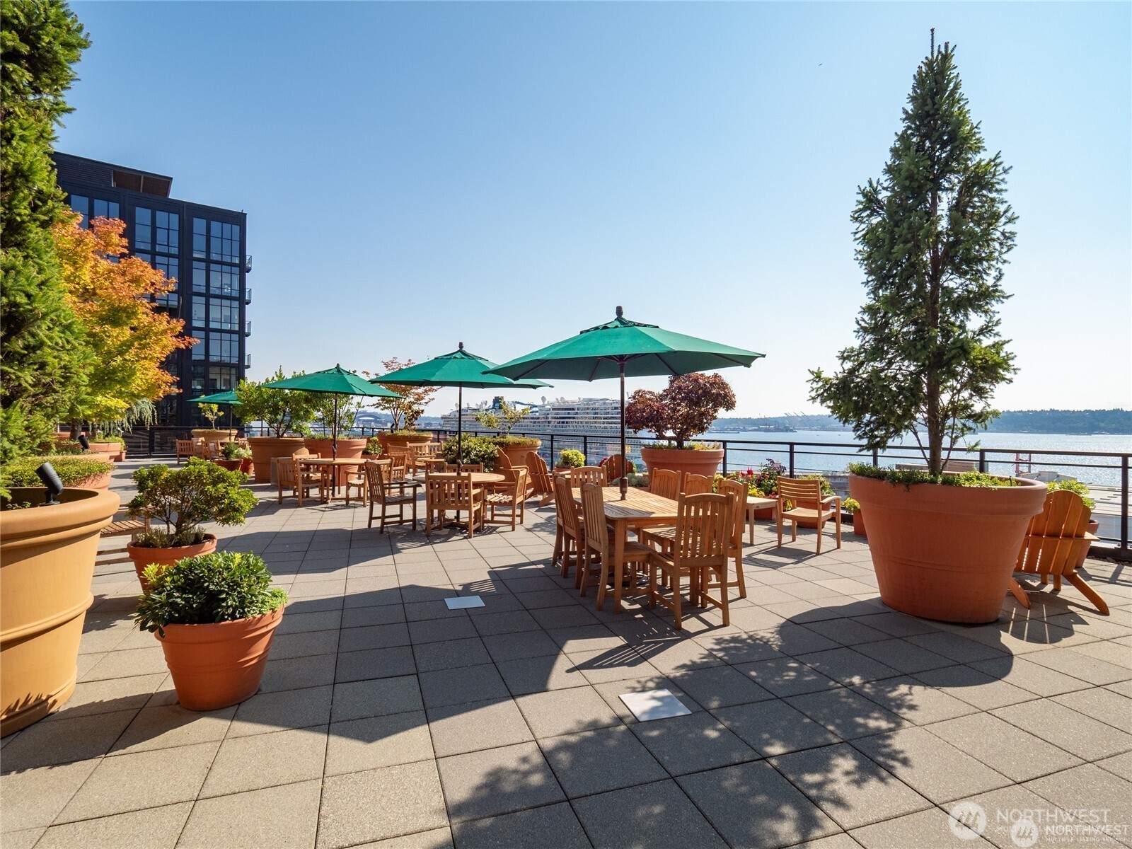 2607 Western Avenue, Unit 612 Seattle, WA 98121 - Photo 26 of 29 a view of a patio with chairs and tables