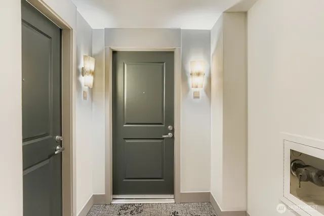 a view of a bathroom from the hallway