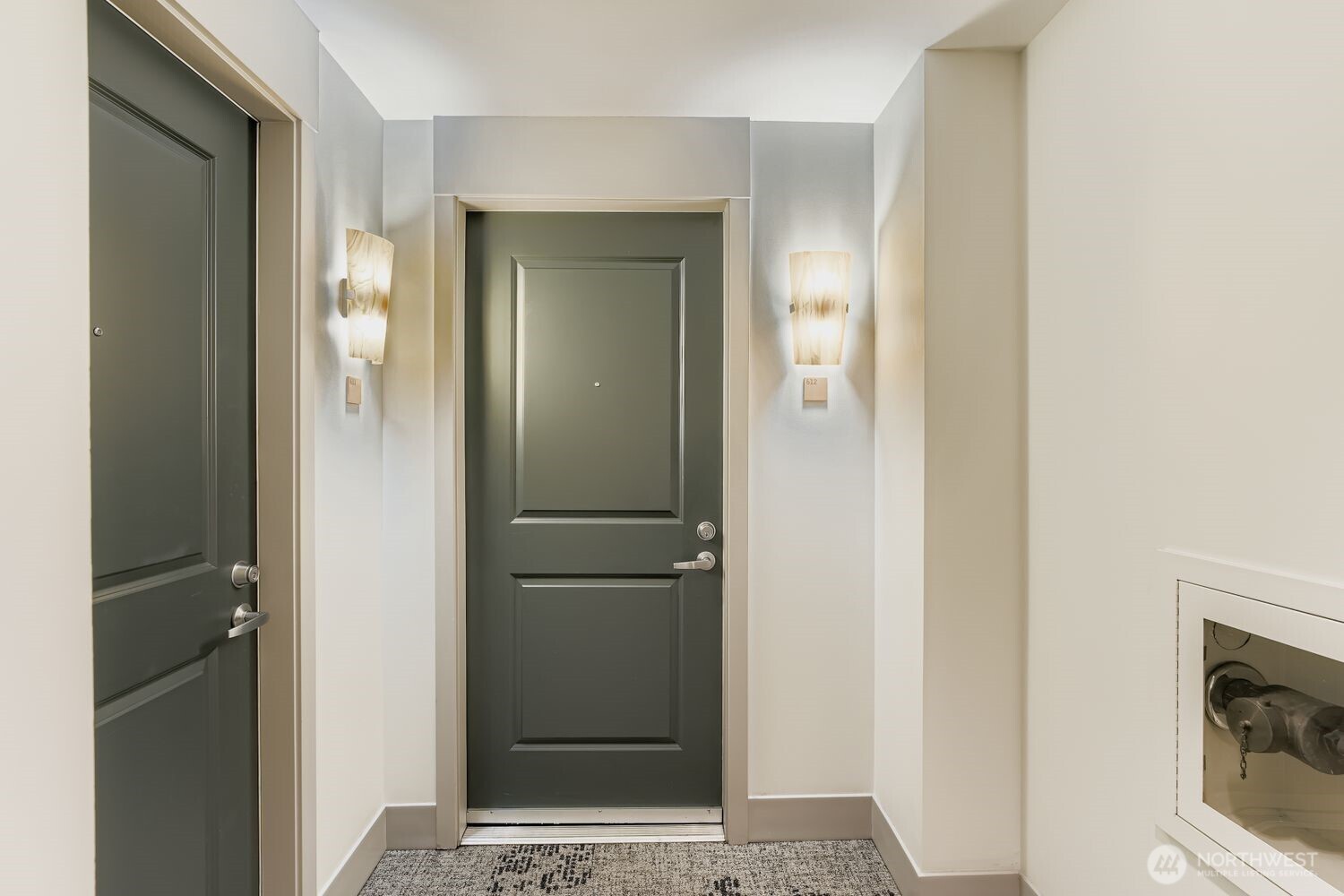 2607 Western Avenue, Unit 612 Seattle, WA 98121 - Photo 4 of 29 a view of a bathroom from the hallway