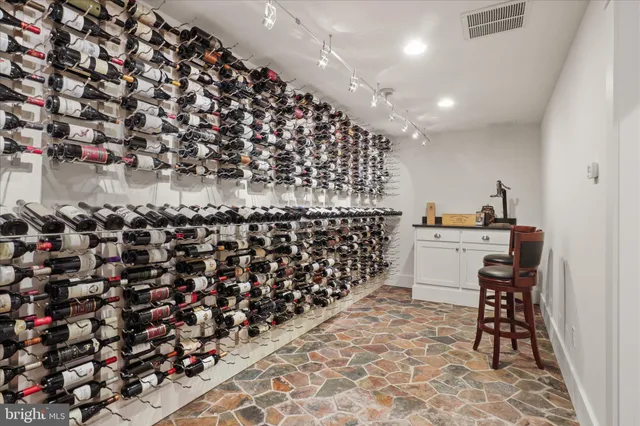 a view of a chair and table on the wooden deck