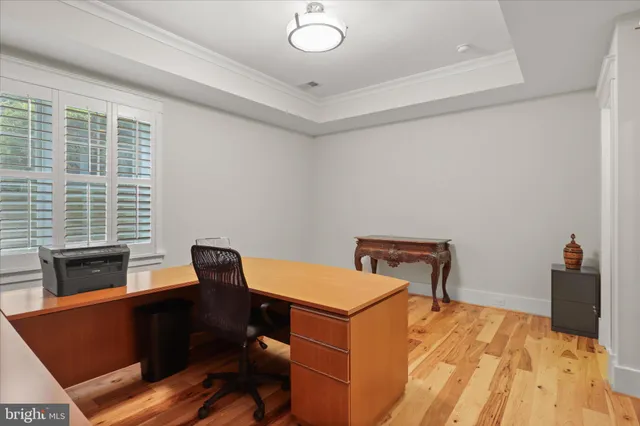 a view of a house with entrance door and garden