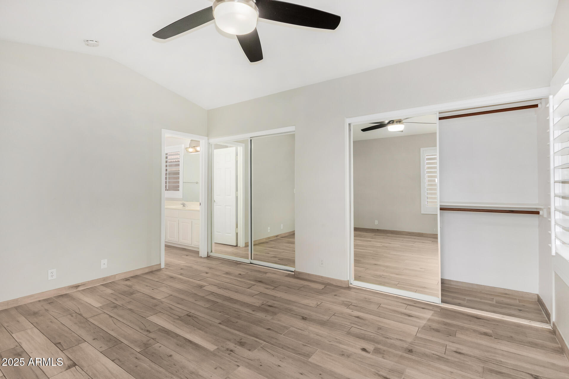 3942 East Agave Road Phoenix, AZ 85044 - Photo 16 of 30 wooden floor in an empty room