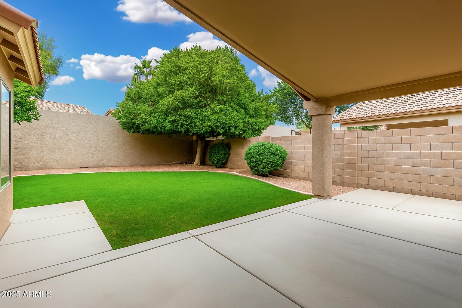 3942 East Agave Road Phoenix, AZ 85044 - Photo 26 of 30 a house view with a garden space