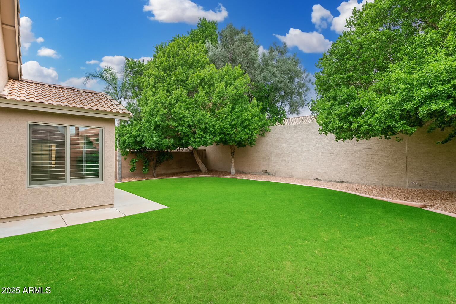 3942 East Agave Road Phoenix, AZ 85044 - Photo 27 of 30 a view of yard with green space
