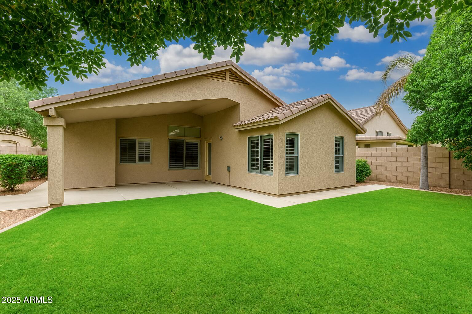 3942 East Agave Road Phoenix, AZ 85044 - Photo 28 of 30 a view of a house with a yard