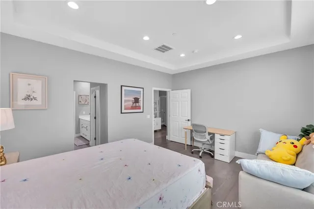 a bedroom with a bed and furniture