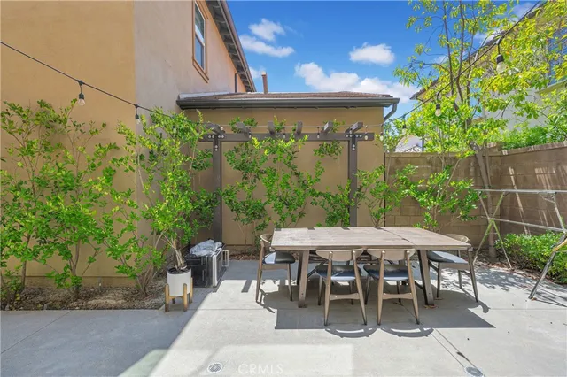 a view of a tables and chairs in patio