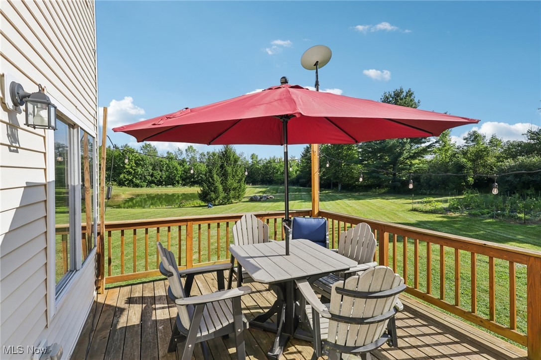12881 Forest Road Burton, OH 44021 - Photo 39 of 48 Rear Deck with outdoor dining space overlooking the large and private backyard.