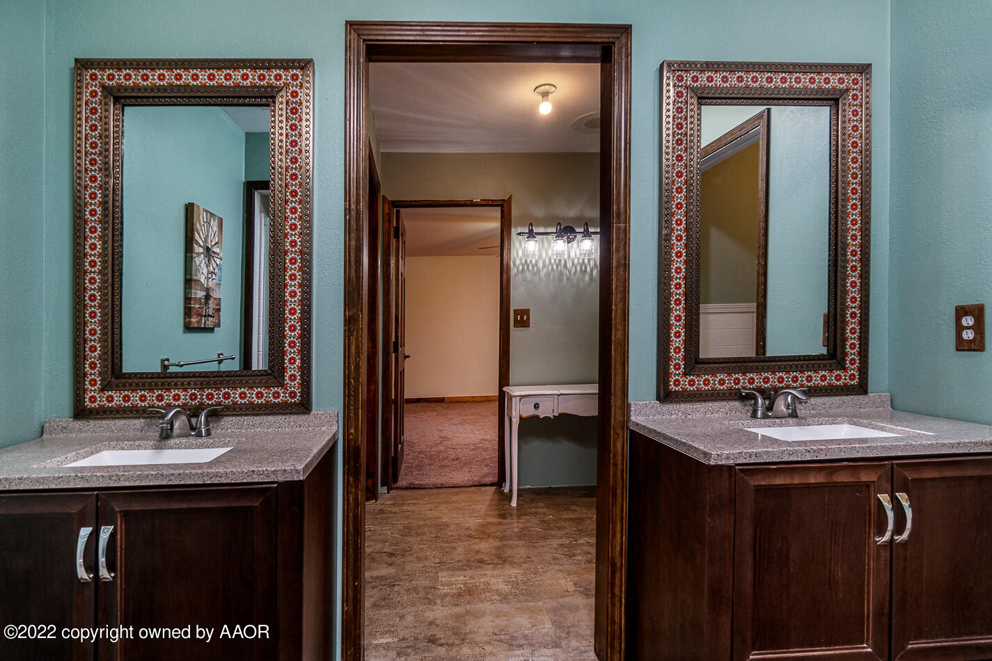 8780 County Line Road Fritch, TX 79036 - Photo 18 of 48 a bathroom with a sink and a mirror