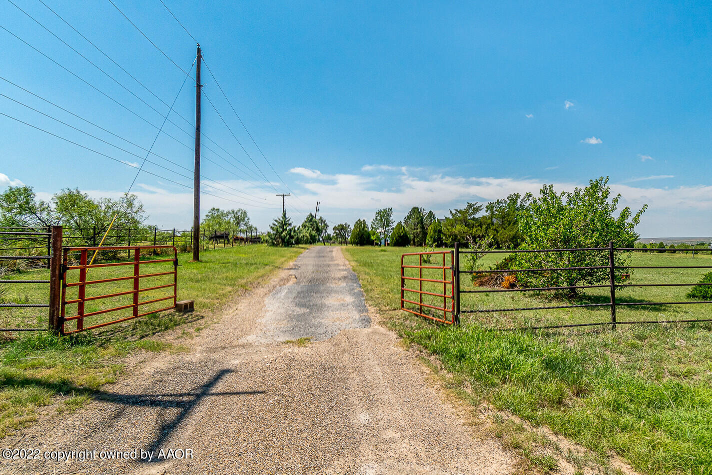 8780 County Line Road Fritch, TX 79036 - Photo 2 of 48 a view of a park with large trees