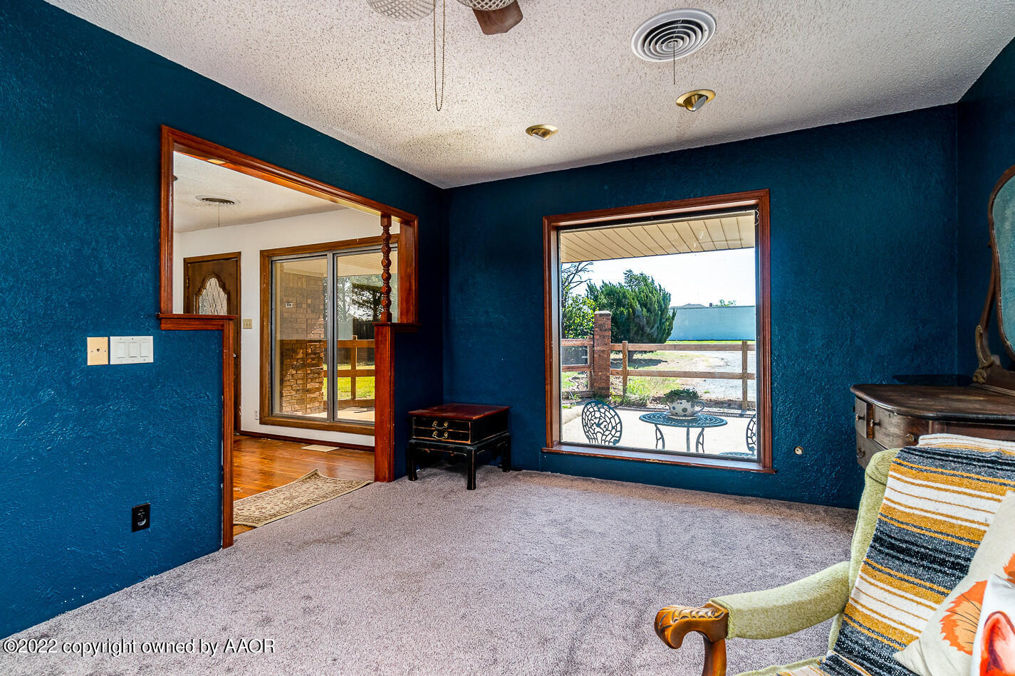 8780 County Line Road Fritch, TX 79036 - Photo 23 of 48 a living room with furniture and a flat screen tv
