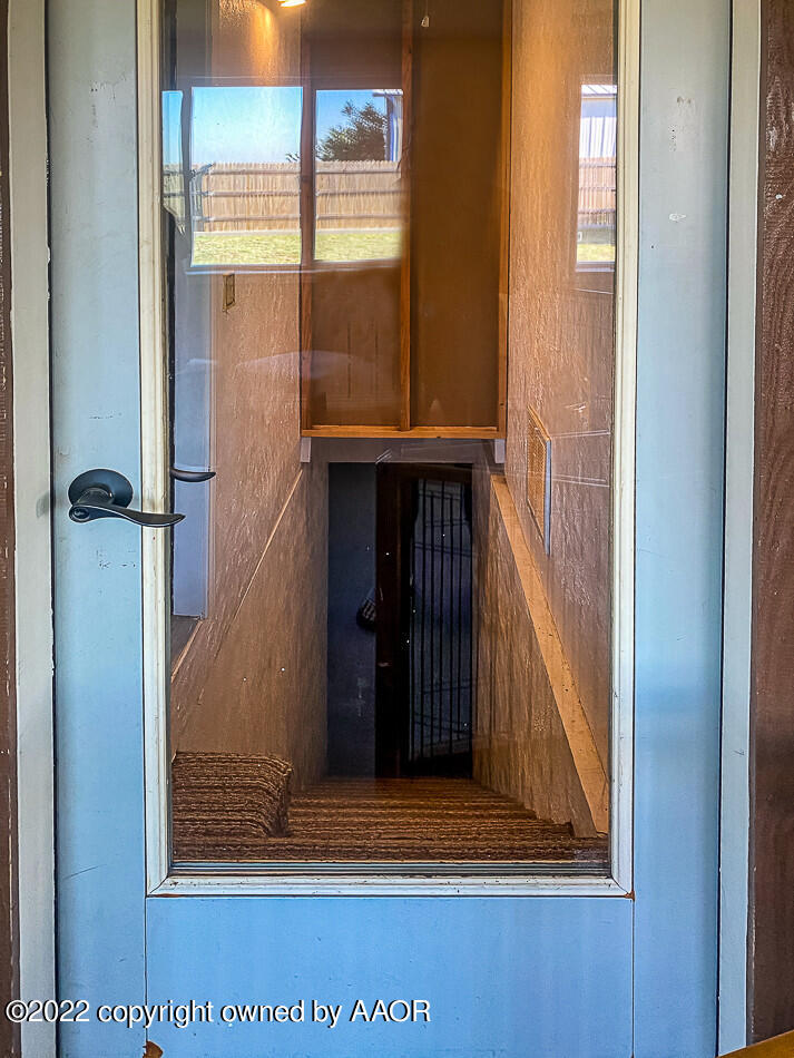 8780 County Line Road Fritch, TX 79036 - Photo 27 of 48 a view of a wooden door