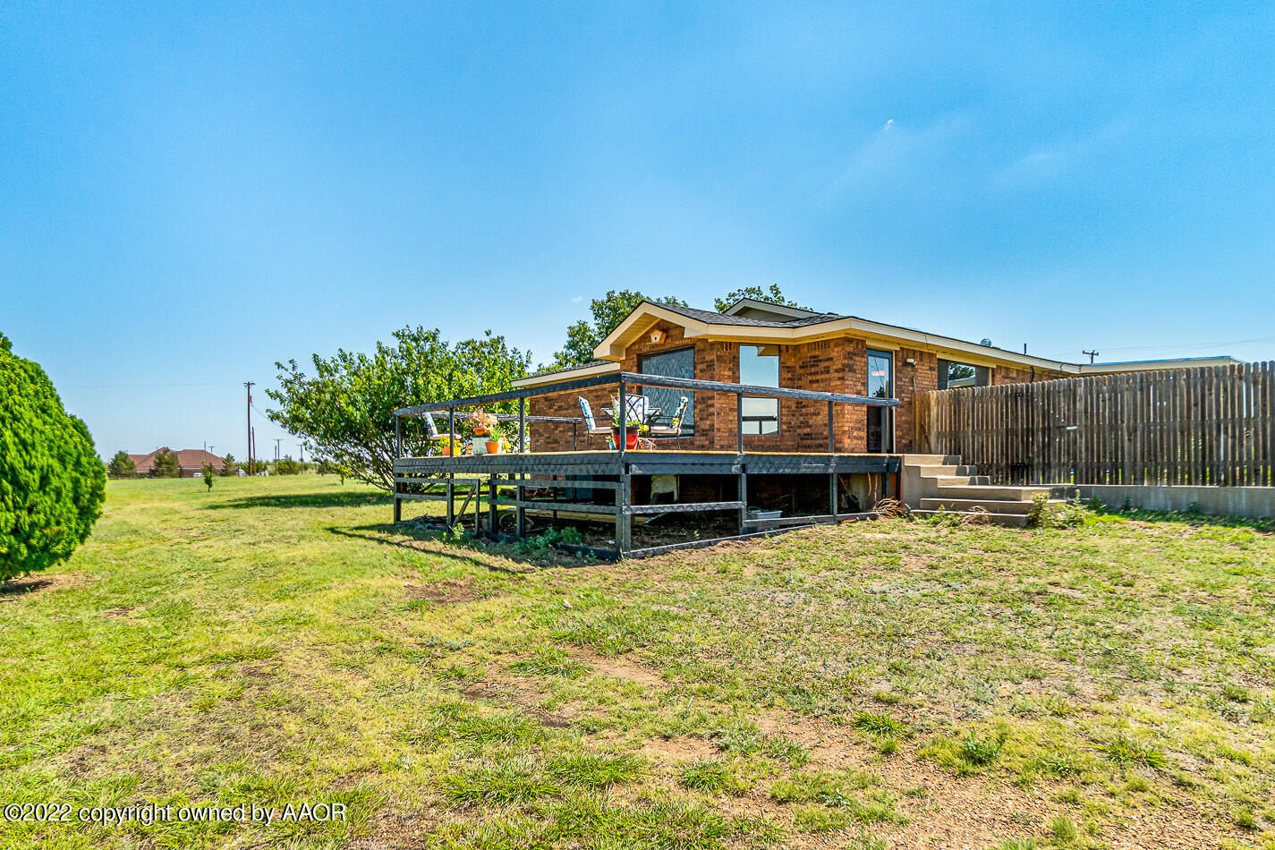8780 County Line Road Fritch, TX 79036 - Photo 30 of 48 a view of a house with a yard patio and swimming pool