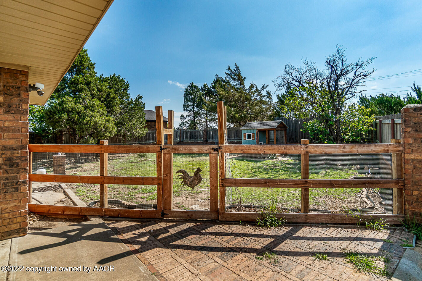8780 County Line Road Fritch, TX 79036 - Photo 31 of 48 a view of a house with a backyard