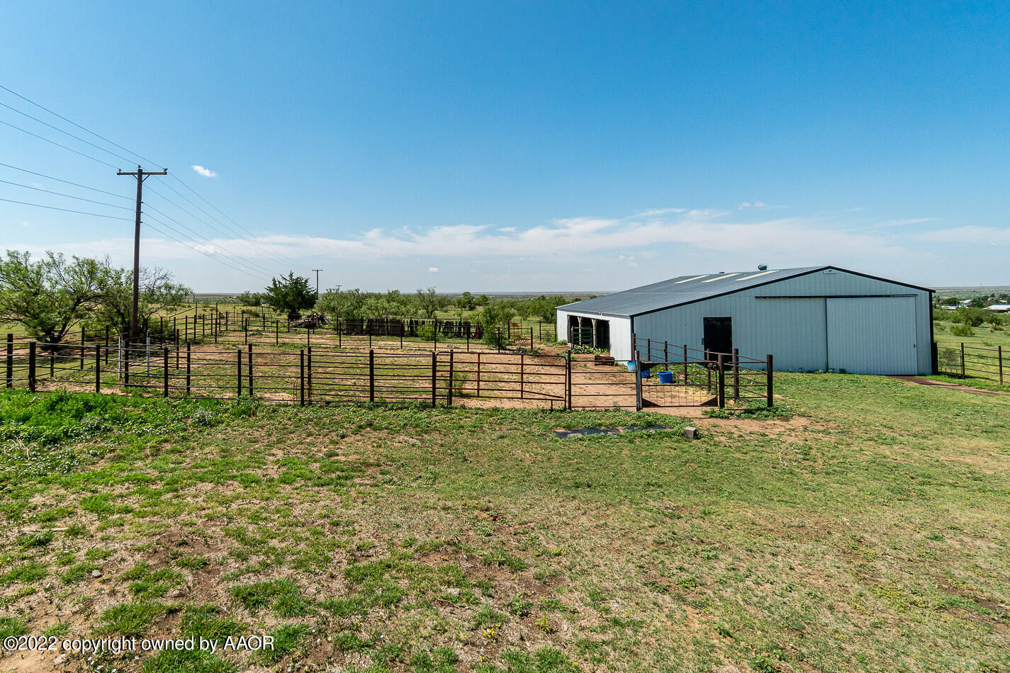 8780 County Line Road Fritch, TX 79036 - Photo 38 of 48 a house view with swimming pool in front of it