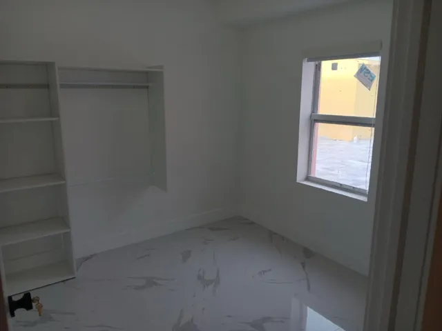 an empty room with a window