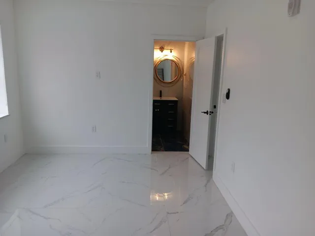 a view of empty room with painted walls