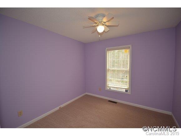 164 Thistle Ridge Clyde, NC 28721 - Photo 13 of 16 a view of an empty room with a window