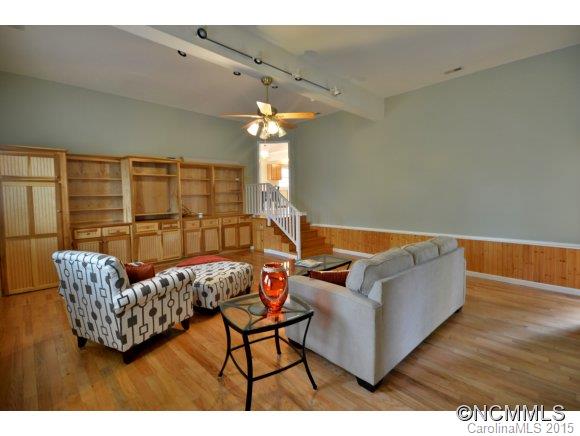 164 Thistle Ridge Clyde, NC 28721 - Photo 6 of 16 a living room with furniture and a large window