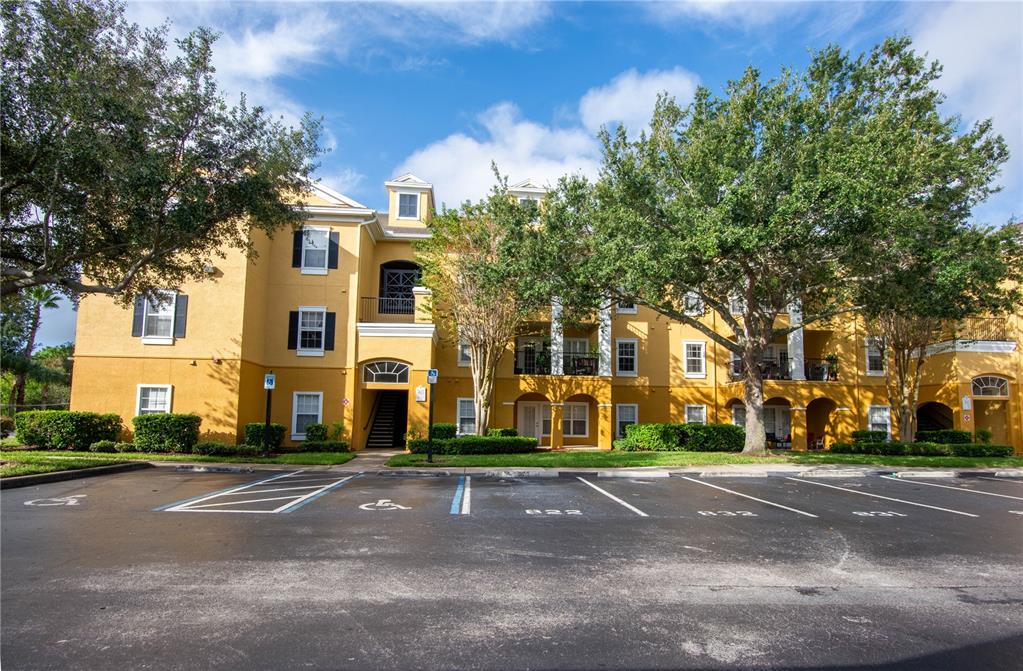 3611 Conroy Road, Unit 834 Orlando, FL 32839 - Photo 1 of 41 front view of a building with a street