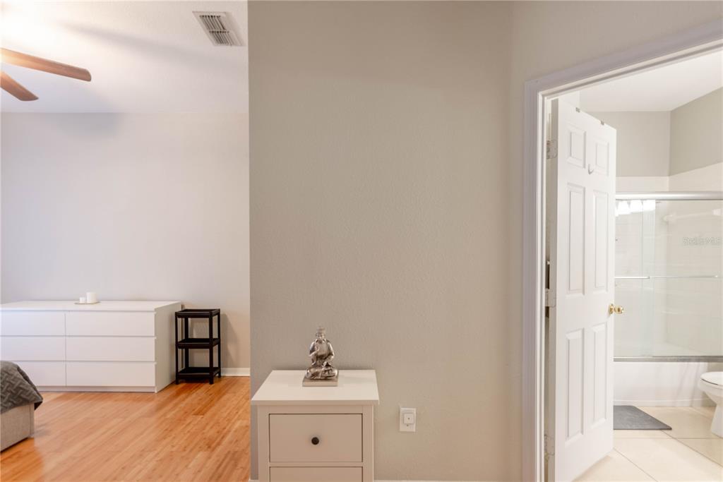 3611 Conroy Road, Unit 834 Orlando, FL 32839 - Photo 13 of 41 a bathroom with a sink and a mirror
