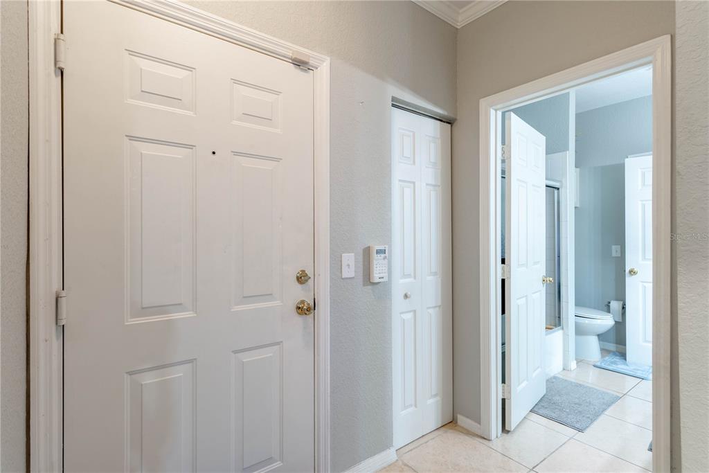 3611 Conroy Road, Unit 834 Orlando, FL 32839 - Photo 21 of 41 a view of a bathroom from a hallway