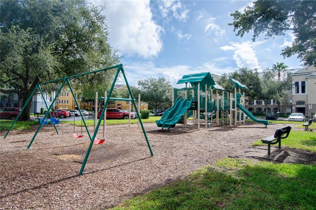 3611 Conroy Road, Unit 834 Orlando, FL 32839 - Photo 30 of 41 a view of park with swings
