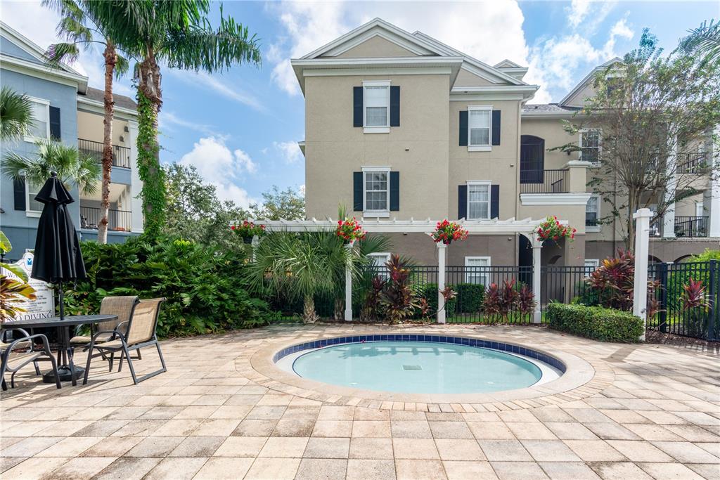 3611 Conroy Road, Unit 834 Orlando, FL 32839 - Photo 36 of 41 a front view of a house with swimming pool