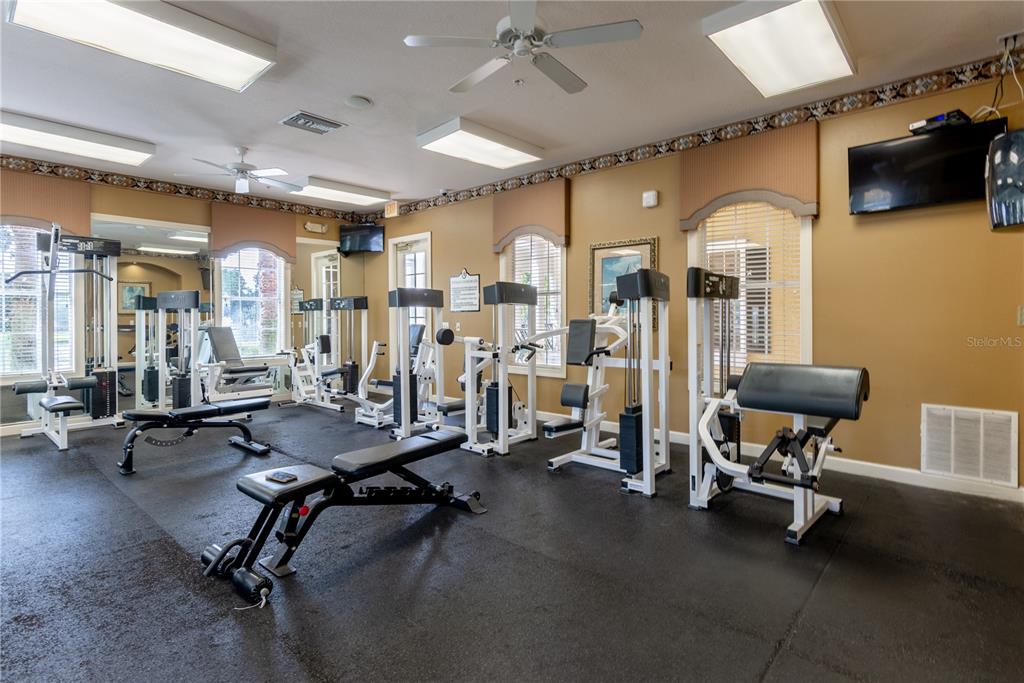 3611 Conroy Road, Unit 834 Orlando, FL 32839 - Photo 40 of 41 a view of a room with gym equipment