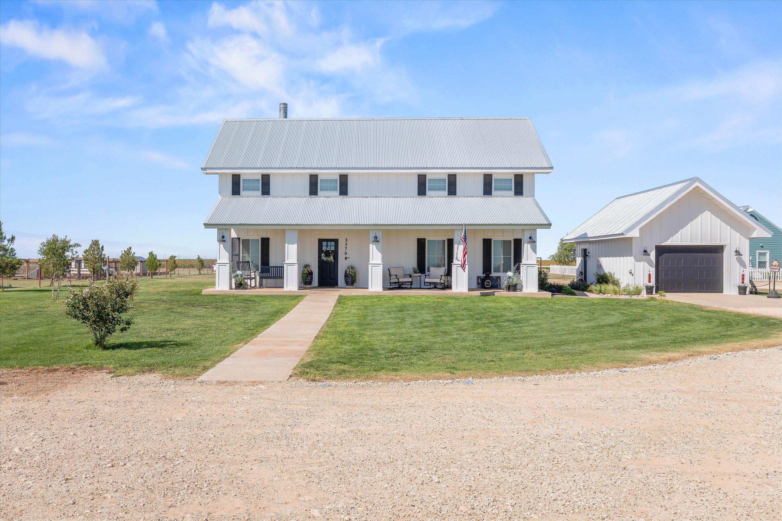3370 Drill Stem Road Levelland, TX 79336 - Photo 2 of 59 front view of house with a yard