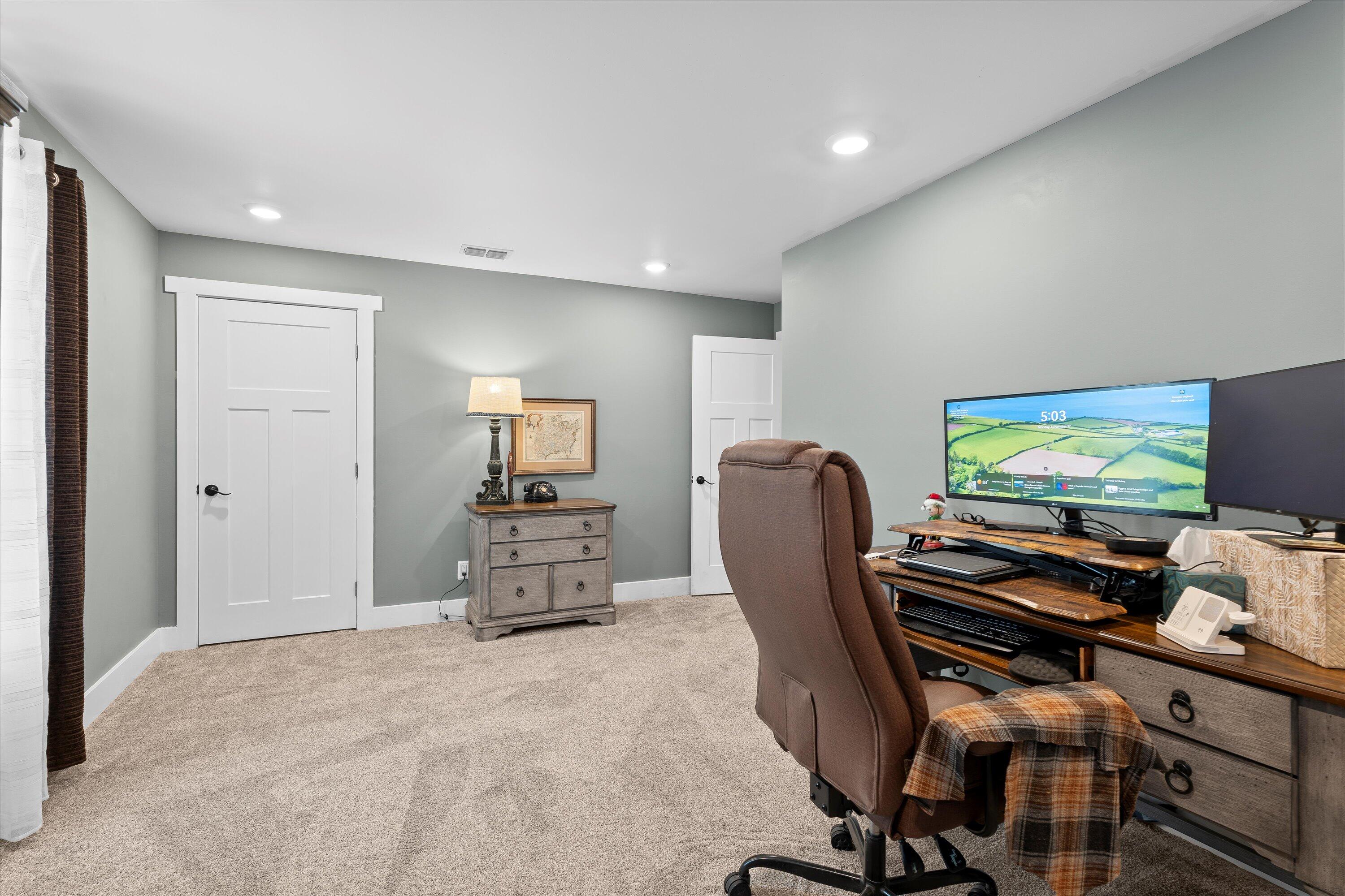 3370 Drill Stem Road Levelland, TX 79336 - Photo 29 of 59 a room with furniture and a window