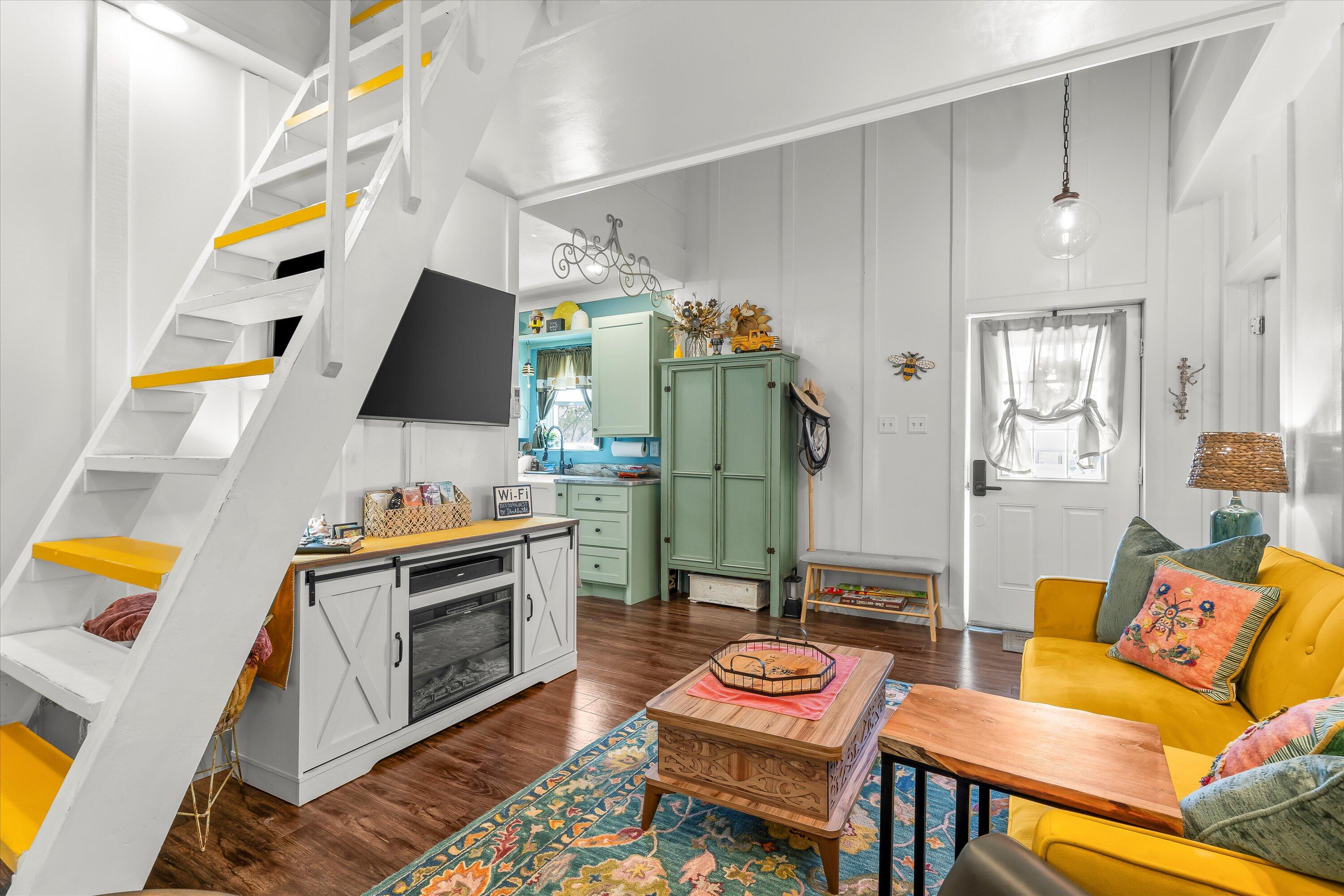 3370 Drill Stem Road Levelland, TX 79336 - Photo 42 of 59 a living room with furniture and a flat screen tv