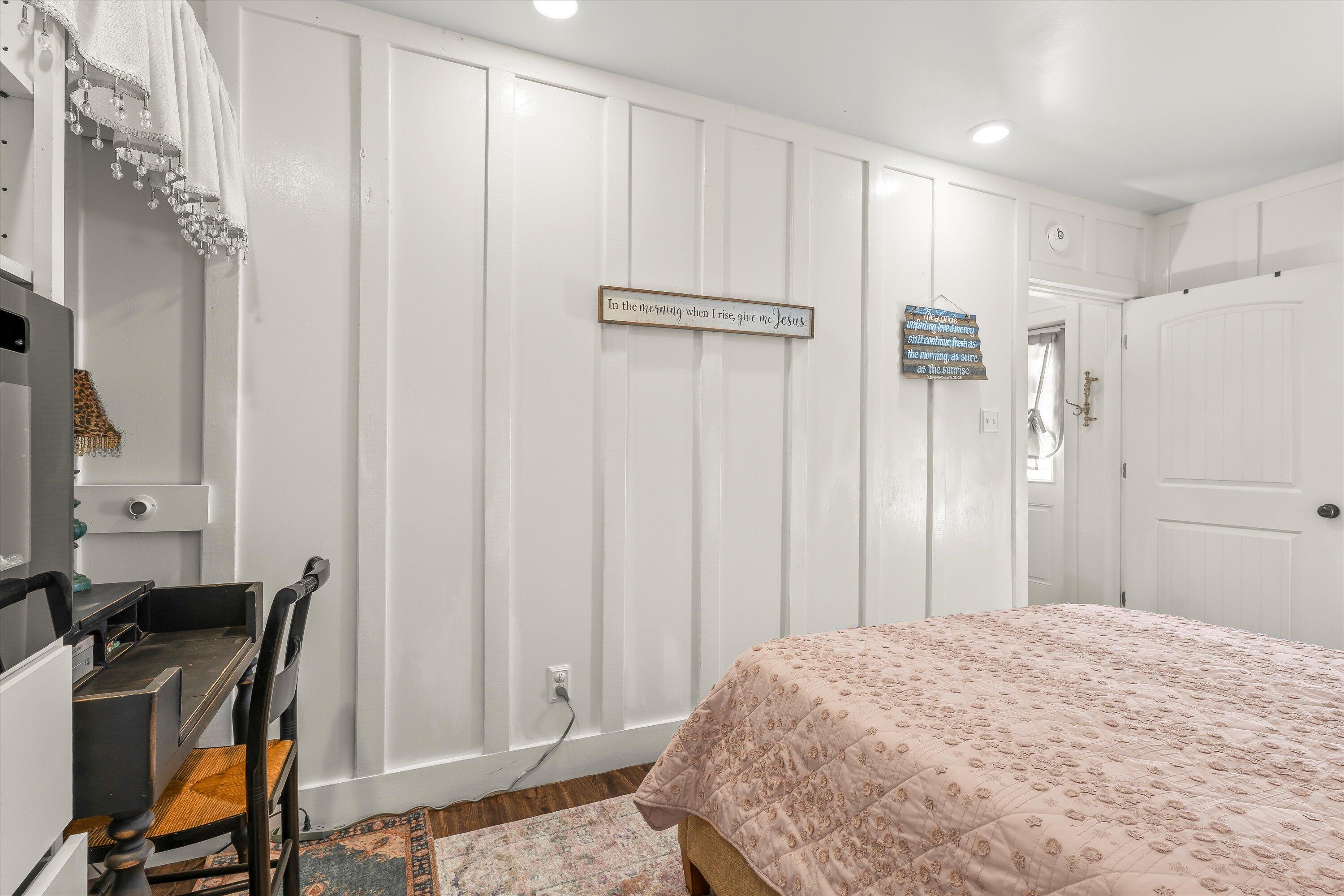 3370 Drill Stem Road Levelland, TX 79336 - Photo 49 of 59 a bedroom with a bed and a desk