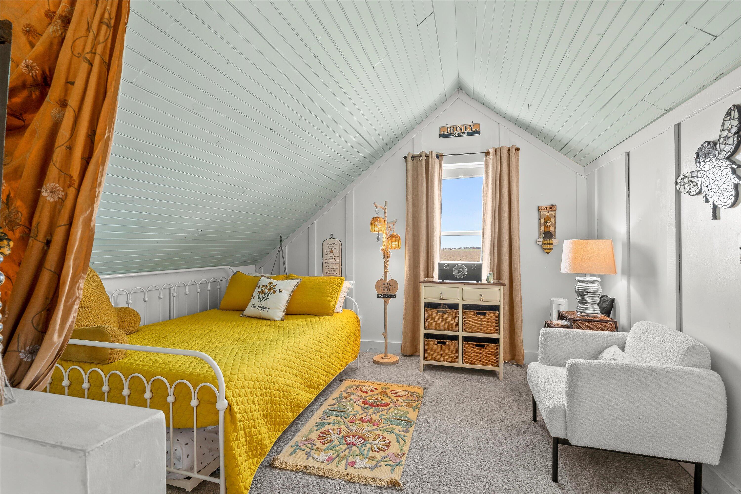 3370 Drill Stem Road Levelland, TX 79336 - Photo 50 of 59 a bed room with a bed and a chair