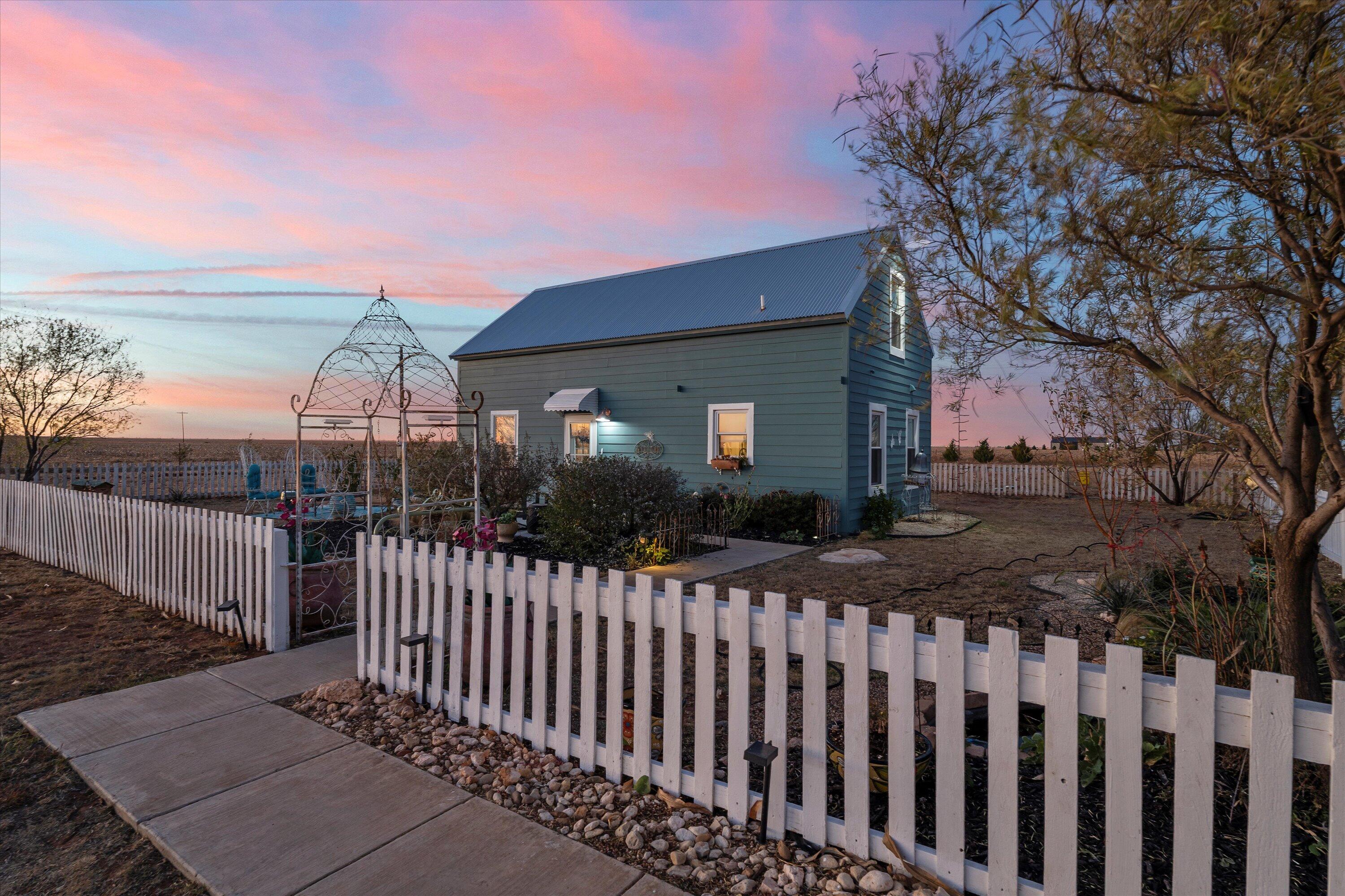 3370 Drill Stem Road Levelland, TX 79336 - Photo 59 of 59 a front view of a house having yard
