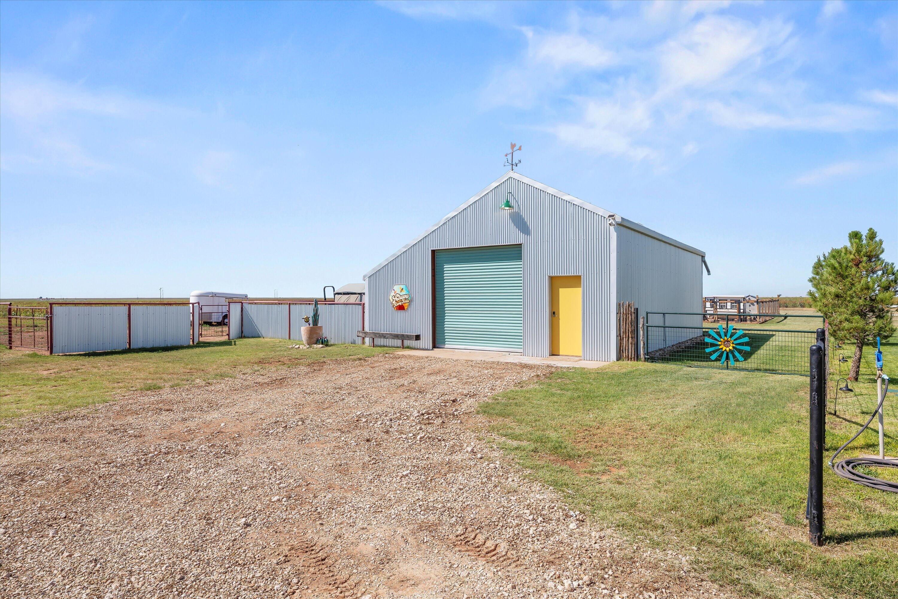 3370 Drill Stem Road Levelland, TX 79336 - Photo 6 of 59 a view of a big room with closet and yard
