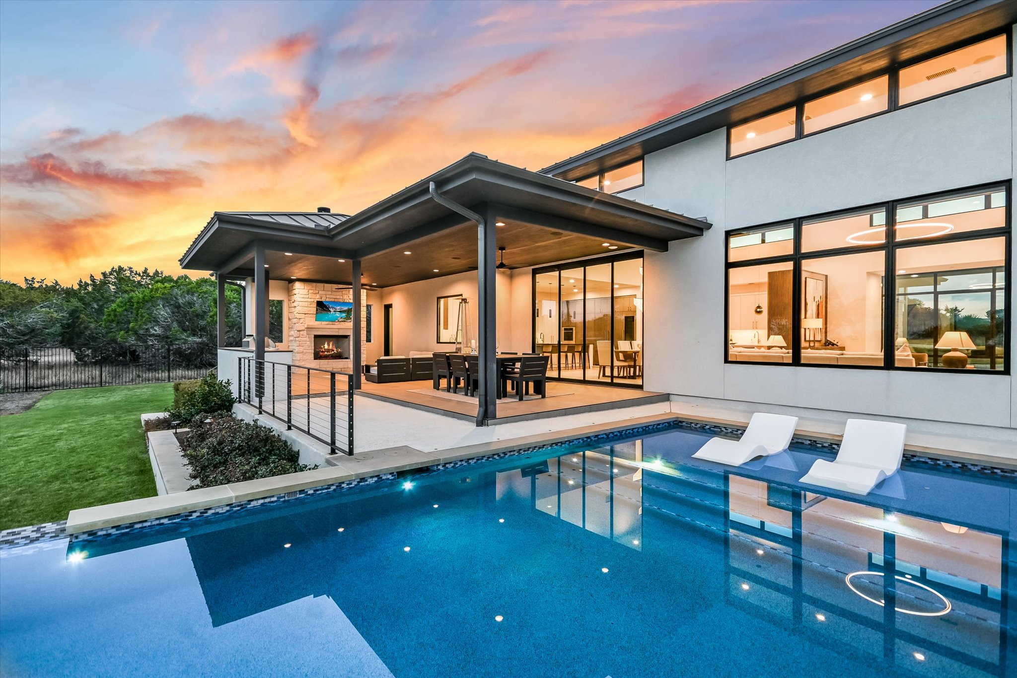 6509 Madrone Tree Lane Austin, TX 78738 - Photo 35 of 40 Back of house with an outdoor pool, a patio area, and an outdoor lounge area