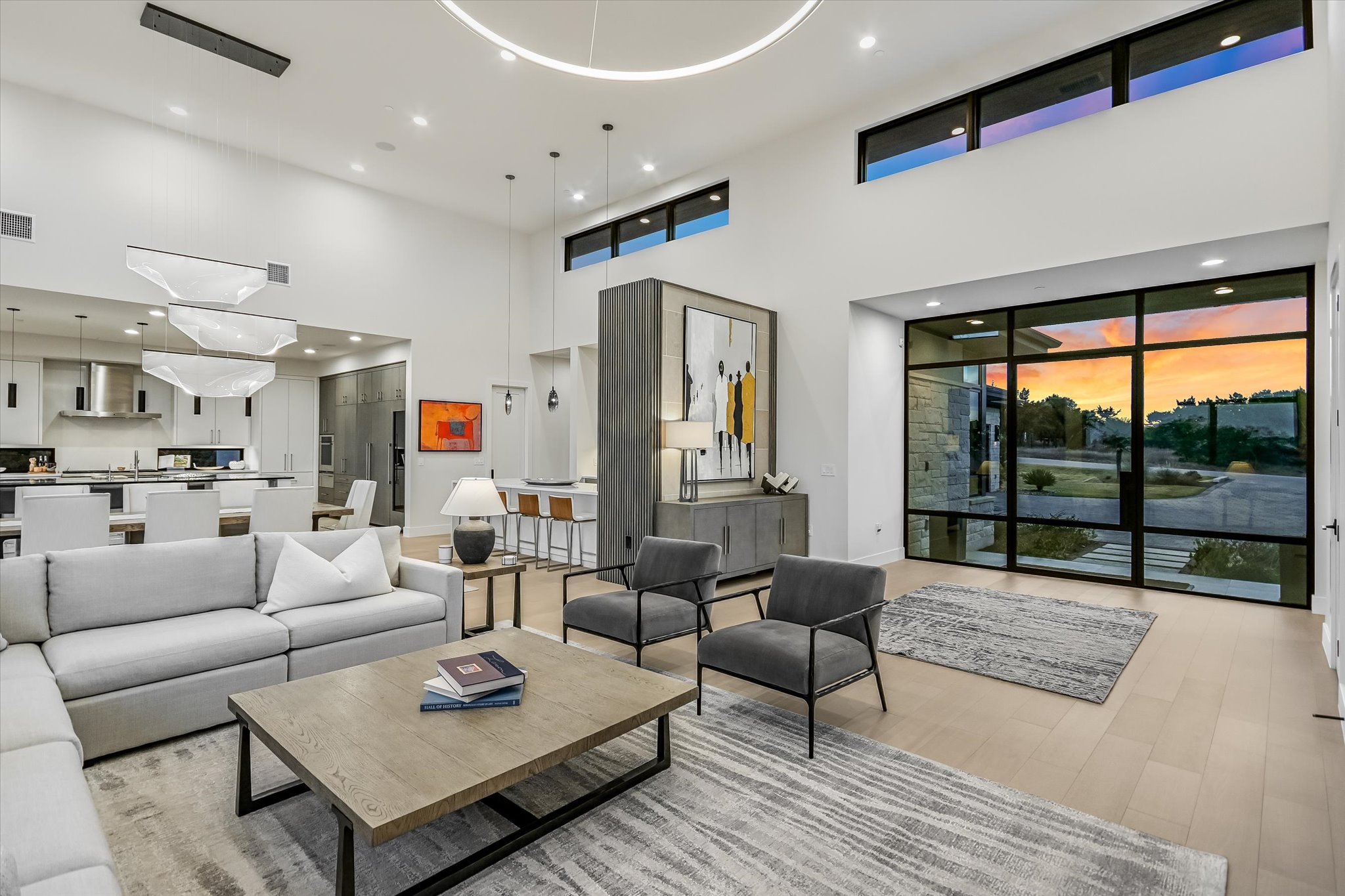 6509 Madrone Tree Lane Austin, TX 78738 - Photo 5 of 40 Living area featuring recessed lighting, light wood finished floors, and a high ceiling